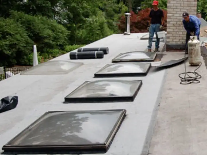 Row of new skylights on a flat roof